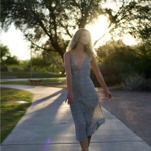 Elegant Cream & Black Dotted Sleeveless Dress